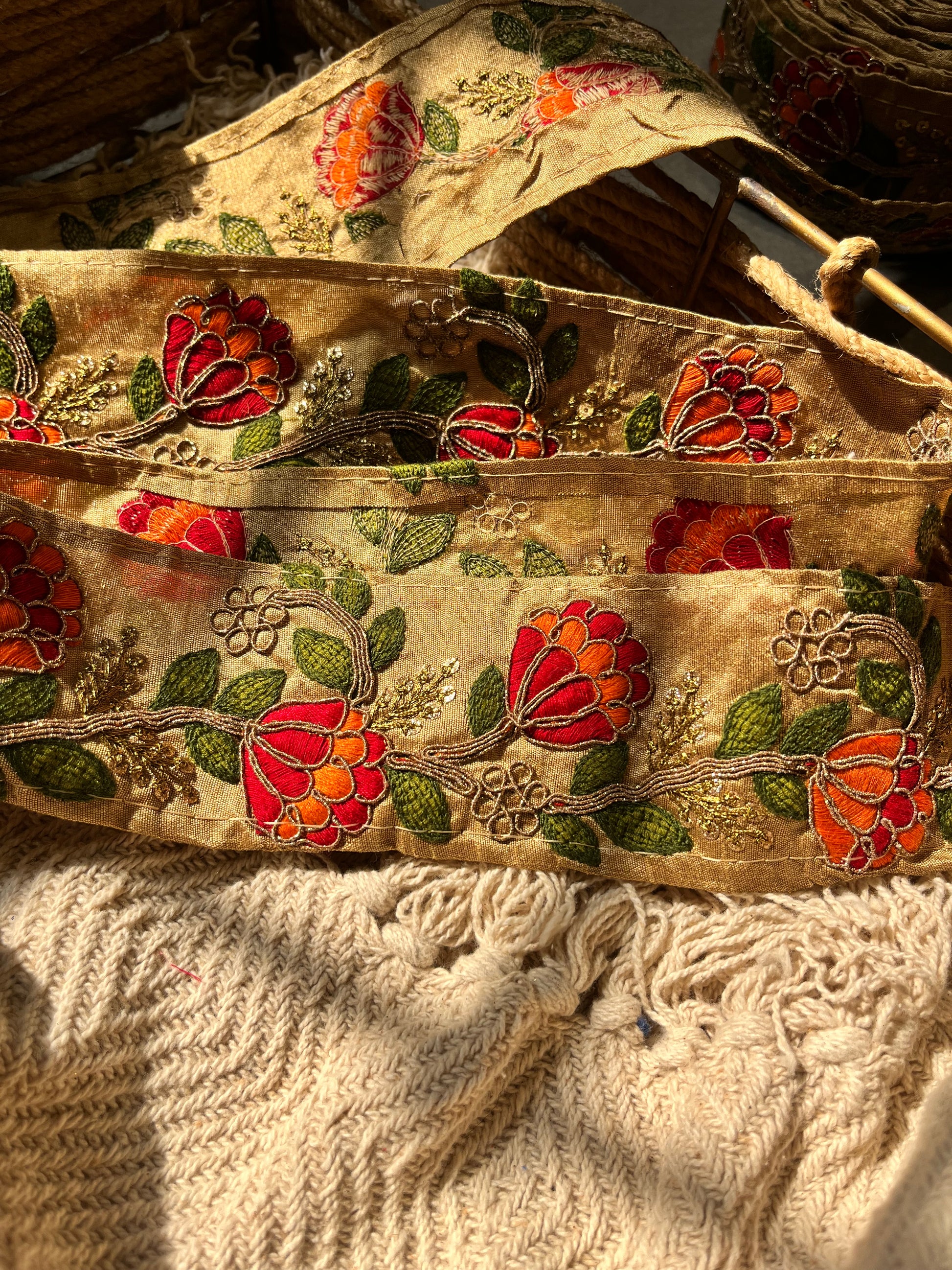 Traditional Floral Embroidered Lace with Red & Orange Blossoms